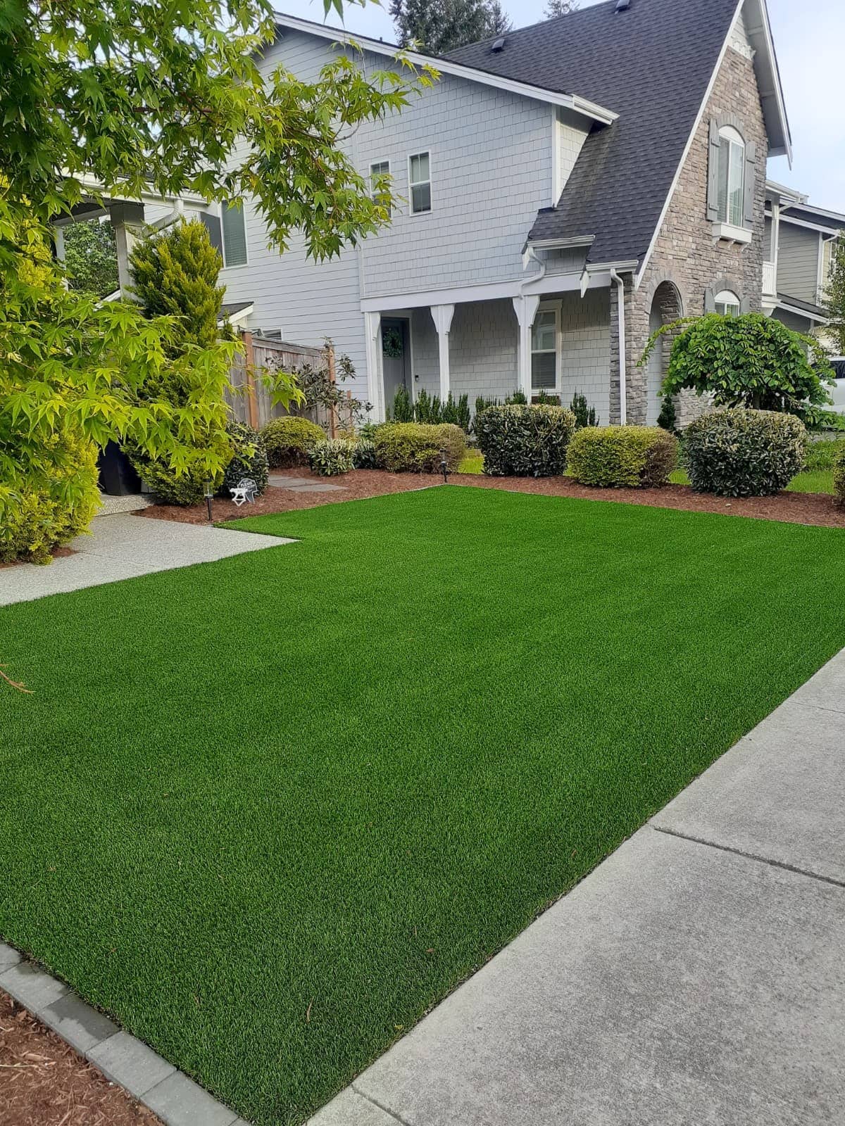 Front-yard turf lawn, craftsman house